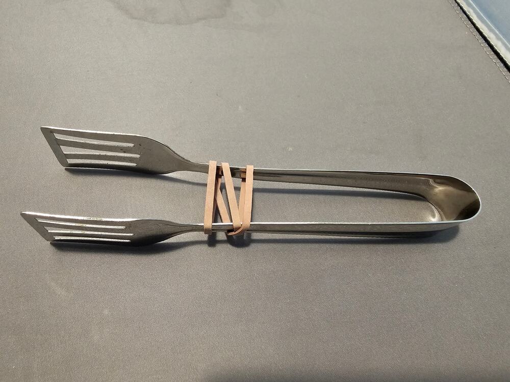 Silver Stainless Steel Tongs - 7" Long (used)